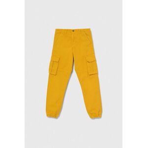 Dětské bavlněné kalhoty Guess žlutá barva, hladké
