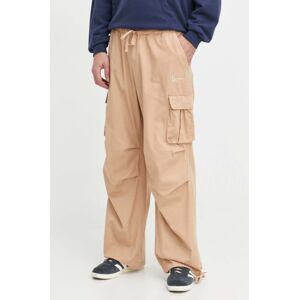 Bavlněné kalhoty Karl Kani béžová barva, jednoduché